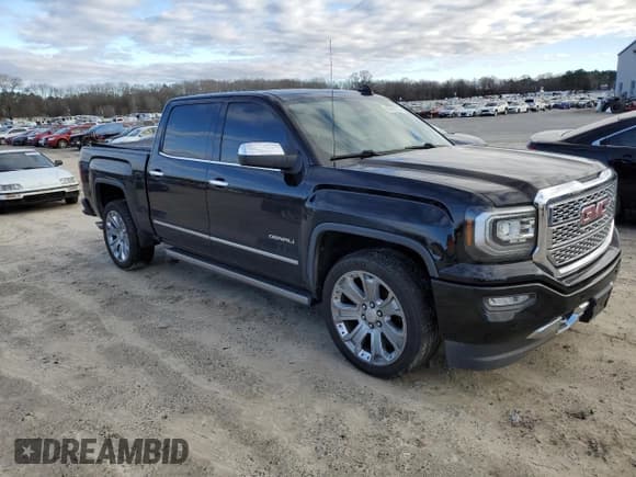 ✅ 2017 GMC Sierra 1500 Denali • VIN: 3GTU2PEJ5HG448778 • Lot: 86963134. Listed on Copart with 126,642 mi. Free auction sales archive from the USA and detailed vehicle history report at DreamBid. Image 4.