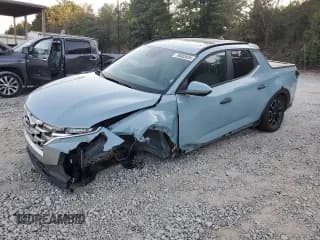 ✅ 2022 Hyundai Santa Cruz SEL • VIN: 5NTJCDAE1NH032013 • Лот: 76085934. Опубликован ранее на Copart с пробегом 28 824 миль. Бесплатный доступ к архиву аукционных продаж из США и подробный отчёт об истории автомобиля на DreamBid. Изображение 1.