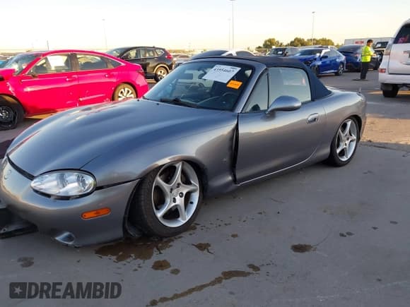 ✅ 2003 Mazda MX-5 Miata Cloth • VIN: JM1NB353430305056 • Lot: 43554607. Wystawiony na IAAI z przebiegiem 101 336 mil. Bezpłatny archiwum sprzedaży aukcyjnych z USA i szczegółowy raport historii pojazdu na DreamBid. Zdjęcie 2.
