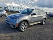 ✅ 2011 BMW X5 35d • VIN: 5UXZW0C50BL369163 • Lot: 89516705. Listed on Copart with 166,314 mi. Free auction sales archive from the USA and detailed vehicle history report at DreamBid. Image 1.