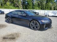 ✅ 2021 Audi RS 7 • VIN: WUAPCBF26MN909897 • Lot: 68984704. Wystawiony na Copart z przebiegiem 29 296 mil. Bezpłatny archiwum sprzedaży aukcyjnych z USA i szczegółowy raport historii pojazdu na DreamBid. Zdjęcie 4.