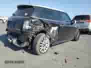 2014 MINI Hardtop S with VIN WMWXM7C59ET987820, listed as a Copart auction lot 59164955 with 77,699 mi miles and Salvage title. Bid and sale history available at DreamBid. Image 3.