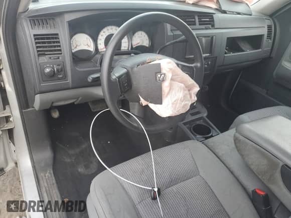 2008 Dodge Dakota SXT с VIN 1D3HE32N68S590310, выставлен на аукционе Copart как лот 52570605 с пробегом Не указан миль и Списание • Salvage title. История ставок и продаж доступна на DreamBid. Изображение 8.