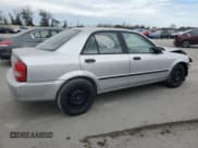 ✅ 2001 Mazda Protege DX • VIN: JM1BJ222310425181 • Lot: 88560255. Wystawiony na Copart z przebiegiem 201 942 mil. Bezpłatny archiwum sprzedaży aukcyjnych z USA i szczegółowy raport historii pojazdu na DreamBid. Zdjęcie 3.