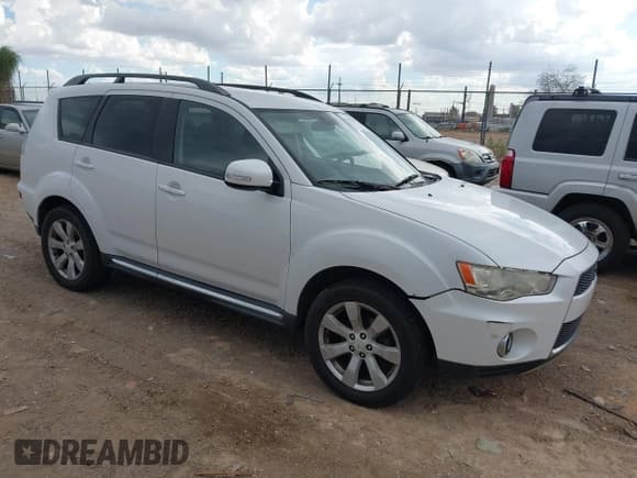 ✅ 2010 Mitsubishi Outlander XLS • VIN: JA4JT4AX8AZ000852 • Lot: 42816593. Listed on IAAI with 195,098 mi. Free auction sales archive from the USA and detailed vehicle history report at DreamBid. Image 1.