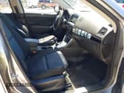 ✅ 2015 Mazda CX-5 Sport • VIN: JM3KE2BEXF0527431 • Lot: 41832024. Listed on IAAI with 131,215 mi. Free auction sales archive from the USA and detailed vehicle history report at DreamBid. Image 5.