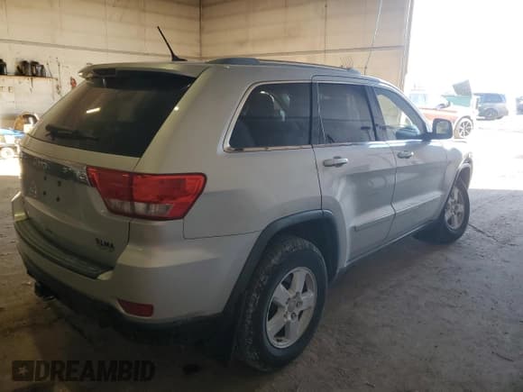 ✅ 2012 Jeep Grand Cherokee Laredo • VIN: 1C4RJFAG7CC149608 • Лот: 91670075. Опубликован ранее на Copart с пробегом 216 255 миль. Бесплатный доступ к архиву аукционных продаж из США и подробный отчёт об истории автомобиля на DreamBid. Изображение 3.