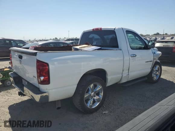 2007 Dodge 1500 SLT with VIN 1D7HA16217J521107, listed as a Copart auction lot 63311714 with 162,428 mi miles and Salvage title. Bid and sale history available at DreamBid. Image 3.