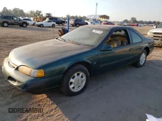✅ 1995 Ford Thunderbird LX • VIN: 1FALP62W0SH186954 • Лот: 77611114. Опубликован ранее на Copart с пробегом 75 550 миль. Бесплатный доступ к архиву аукционных продаж из США и подробный отчёт об истории автомобиля на DreamBid. Изображение 1.