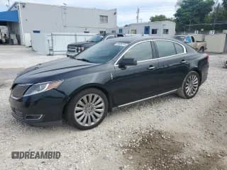 ✅ 2014 Lincoln MKS • VIN: 1LNHL9EK8EG600624 • Лот: 86888745. Опубликован ранее на Copart с пробегом 95 521 миль. Бесплатный доступ к архиву аукционных продаж из США и подробный отчёт об истории автомобиля на DreamBid. Изображение 1.