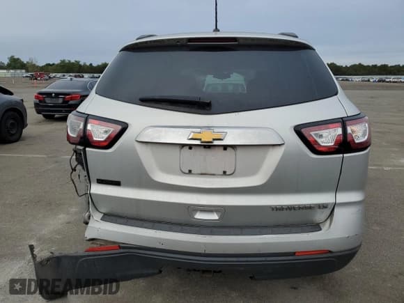 ✅ 2014 Chevrolet Traverse LS • VIN: 1GNKRFKD5EJ210409 • Lot: 71789794. Wystawiony na Copart z przebiegiem 82 645 mil. Bezpłatny archiwum sprzedaży aukcyjnych z USA i szczegółowy raport historii pojazdu na DreamBid. Zdjęcie 6.