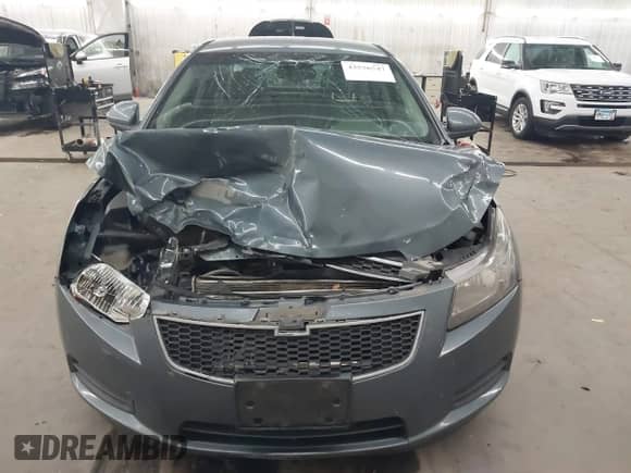 2012 Chevrolet Cruze ECO z VIN 1G1PJ5SC9C7247585, wystawiony jako IAAI lot #43576547 z przebiegiem 245 924 mil mil oraz . Historia ofert i sprzedaży dostępna na DreamBid. Obrazek 6.