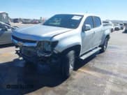 ✅ 2018 Chevrolet Colorado 2WD LT • VIN: 1GCGSCEN7J1143893 • Lot: 42079057. Listed on IAAI with 72,351 mi. Free auction sales archive from the USA and detailed vehicle history report at DreamBid. Image 2.