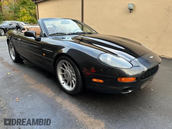 ✅ 1998 Aston Martin DB7 • VIN: SCFAA4126WK202428 • Лот: 79806024. Опубликован ранее на Copart с пробегом 41 266 миль. Бесплатный доступ к архиву аукционных продаж из США и подробный отчёт об истории автомобиля на DreamBid. Изображение 1.