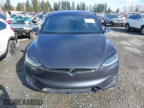 ✅ 2019 Tesla Model X P100D • VIN: 5YJXCBE44KF180391 • Lot: 41690866. Listed on IAAI with 57,863 mi. Free auction sales archive from the USA and detailed vehicle history report at DreamBid. Image 12.