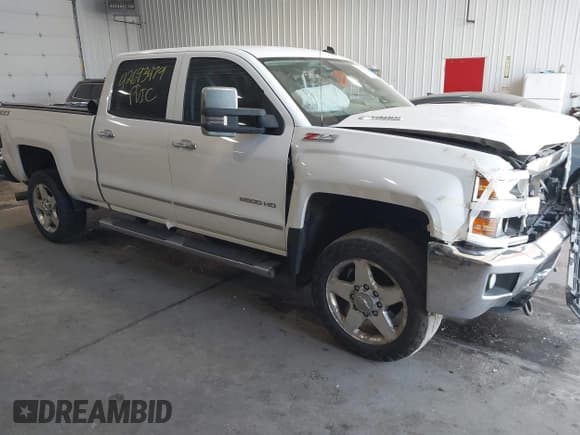 ✅ 2015 Chevrolet Silverado 2500HD LT • VIN: 1GC1KVE83FF119760 • Lot: 42693479. Listed on IAAI with 329,481 mi. Free auction sales archive from the USA and detailed vehicle history report at DreamBid. Image 1.