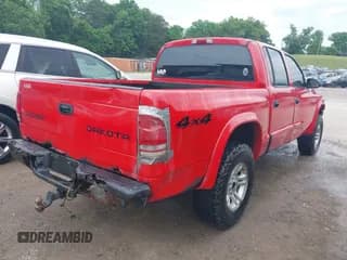 ✅ 2003 Dodge Dakota Sport • VIN: 1D7HG38X03S333959 • Lot: 42306578. Wystawiony na IAAI z przebiegiem 298 949 mil. Bezpłatny archiwum sprzedaży aukcyjnych z USA i szczegółowy raport historii pojazdu na DreamBid. Zdjęcie 4.