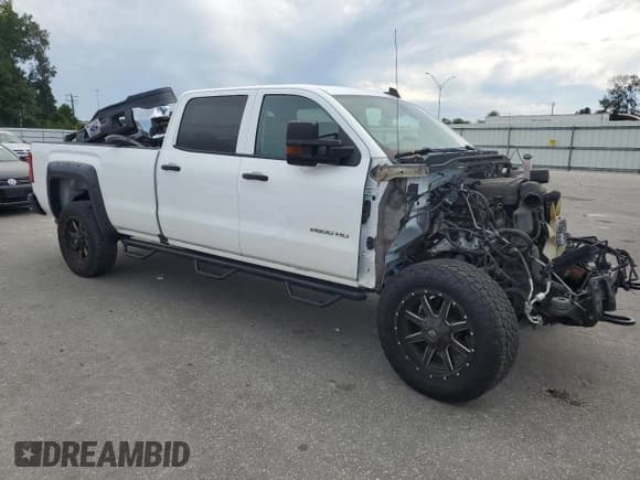 ✅ 2016 GMC Sierra 2500HD • VIN: 1GT12REG0GF133292 • Lot: 71841655. Listed on Copart with 90,733 mi. Free auction sales archive from the USA and detailed vehicle history report at DreamBid. Image 4.