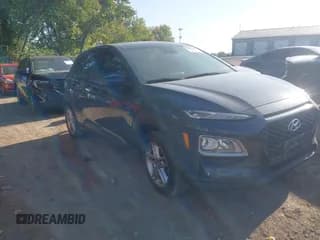 ✅ 2021 Hyundai Kona SE • VIN: KM8K1CAA2MU710011 • Лот: 43158104. Опубликован ранее на IAAI с пробегом 94 128 миль. Бесплатный доступ к архиву аукционных продаж из США и подробный отчёт об истории автомобиля на DreamBid. Изображение 1.