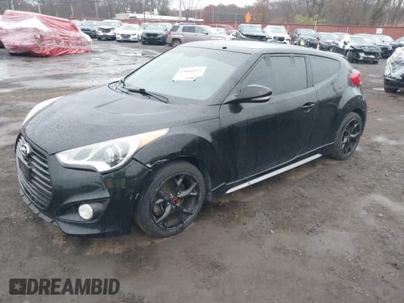 ✅ 2014 Hyundai Veloster Turbo • VIN: KMHTC6AE9EU197022 • Lot: 43800902. Listed on IAAI with 155,258 mi. Free auction sales archive from the USA and detailed vehicle history report at DreamBid. Image 2.