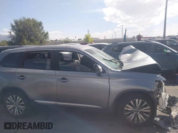 2019 Mitsubishi Outlander ES z VIN JA4AZ3A3XKZ021676, wystawiony jako IAAI lot #43196948 z przebiegiem Nie podano mil oraz . Historia ofert i sprzedaży dostępna na DreamBid. Obrazek 13.