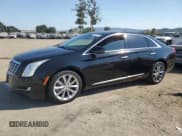 ✅ 2014 Cadillac XTS Livery • VIN: 2G61U5S30E9258998 • Lot: 60367785. Listed on Copart with 290,755 mi. Free auction sales archive from the USA and detailed vehicle history report at DreamBid. Image 1.