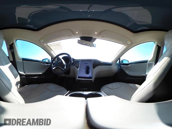 ✅ 2014 Tesla Model S 60 • VIN: 5YJSA1H15EFP66601 • Lot: 42517705. Wystawiony na IAAI z przebiegiem 93 706 mil. Bezpłatny archiwum sprzedaży aukcyjnych z USA i szczegółowy raport historii pojazdu na DreamBid. Zdjęcie 18.