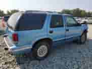 1997 Chevrolet Blazer LS z VIN 1GNDT13W7V2156165, wystawiony jako Copart lot #66759394 z przebiegiem 170 046 mil mil oraz Szkoda całkowita • Salvage title. Historia ofert i sprzedaży dostępna na DreamBid. Obrazek 3.