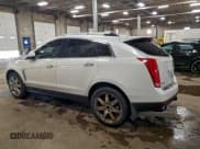 ✅ 2012 Cadillac SRX Premium Collection • VIN: 3GYFNCE39CS561384 • Lot: 96707565. Wystawiony na Copart z przebiegiem 180 316 mil. Bezpłatny archiwum sprzedaży aukcyjnych z USA i szczegółowy raport historii pojazdu na DreamBid. Zdjęcie 2.