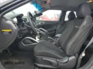 ✅ 2014 Hyundai Veloster • VIN: KMHTC6AD8EU185046 • Lot: 78541194. Wystawiony na Copart z przebiegiem 138 884 mil. Bezpłatny archiwum sprzedaży aukcyjnych z USA i szczegółowy raport historii pojazdu na DreamBid. Zdjęcie 7.