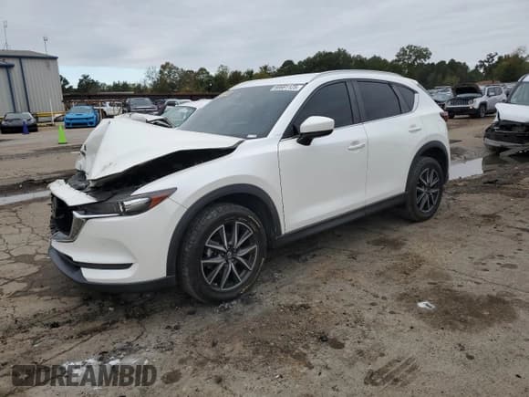 ✅ 2018 Mazda CX-5 Touring • VIN: JM3KFACM0J1429685 • Lot: 90691125. Listed on Copart with 82,393 mi. Free auction sales archive from the USA and detailed vehicle history report at DreamBid. Image 1.