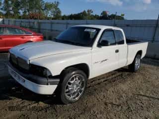 2001 Dodge Dakota with VIN 1B7FL22P01S324076, listed as a Copart auction lot 68478854 with 263,846 mi miles and Salvage title. Bid and sale history available at DreamBid. Image 1.
