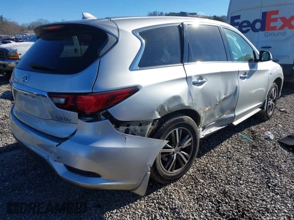 ✅ 2019 Infiniti QX60 Luxe • VIN: 5N1DL0MN3KC555343 • Lot: 41331200. Listed on IAAI with 103,085 mi. Free auction sales archive from the USA and detailed vehicle history report at DreamBid. Image 4.