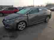 2017 Chevrolet Cruze Premier z VIN 1G1BF5SM4H7234609, wystawiony jako Copart lot #72077702 z przebiegiem 139 650 mil mil oraz . Historia ofert i sprzedaży dostępna na DreamBid. Obrazek 1.