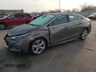 2017 Chevrolet Cruze Premier z VIN 1G1BF5SM4H7234609, wystawiony jako Copart lot #72077702 z przebiegiem 139 650 mil mil oraz . Historia ofert i sprzedaży dostępna na DreamBid. Obrazek 1.