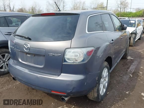 ✅ 2009 Mazda CX-7 Grand Touring • VIN: JM3ER29L090226340 • Lot: 42035530. Wystawiony na IAAI z przebiegiem 189 912 mil. Bezpłatny archiwum sprzedaży aukcyjnych z USA i szczegółowy raport historii pojazdu na DreamBid. Zdjęcie 4.