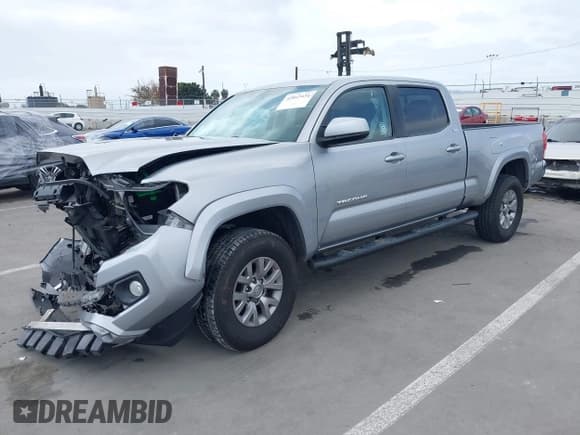 ✅ 2017 Toyota Tacoma SR5 • VIN: 3TMBZ5DN6HM010221 • Lot: 42047434. Listed on IAAI with 88,170 mi. Free auction sales archive from the USA and detailed vehicle history report at DreamBid. Image 17.