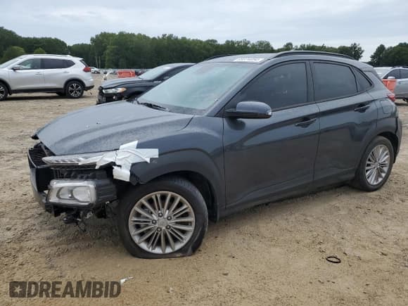 ✅ 2021 Hyundai Kona SEL • VIN: KM8K22AA3MU750671 • Лот: 69874054. Опубликован ранее на Copart с пробегом 30 024 миль. Бесплатный доступ к архиву аукционных продаж из США и подробный отчёт об истории автомобиля на DreamBid. Изображение 1.