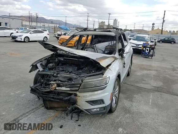 ✅ 2018 Volkswagen Tiguan SEL Premium • VIN: 3VV5B7AX5JM222554 • Lot: 82451415. Listed on Copart with Not provided. Free auction sales archive from the USA and detailed vehicle history report at DreamBid. Image 13.
