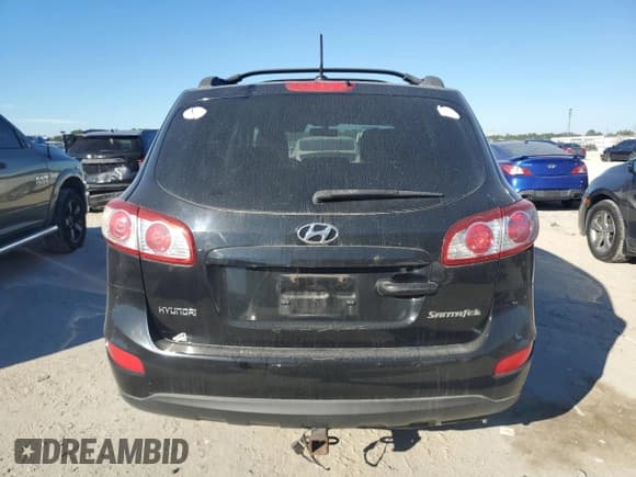 ✅ 2010 Hyundai Santa Fe GLS • VIN: 5NMSGDAB9AH405285 • Lot: 82401784. Listed on Copart with 99,897 mi. Free auction sales archive from the USA and detailed vehicle history report at DreamBid. Image 6.