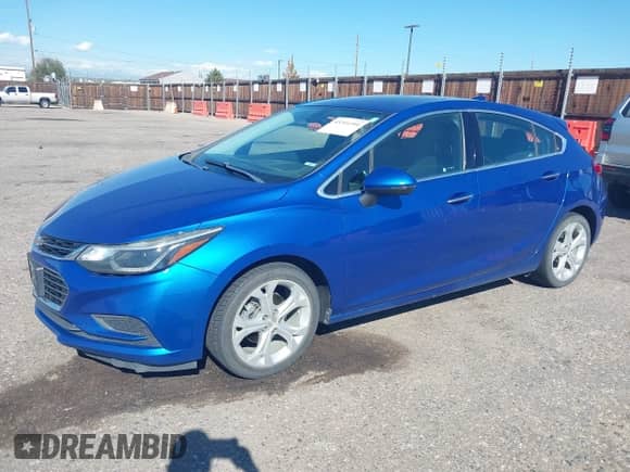2017 Chevrolet Cruze Premier z VIN 3G1BF6SM6HS570740, wystawiony jako IAAI lot #43311391 z przebiegiem 77 877 mil mil oraz . Historia ofert i sprzedaży dostępna na DreamBid. Obrazek 2.