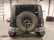 ✅ 2008 Jeep Wrangler Unlimited Sahara • VIN: 1J8GA59178L506853 • Lot: 43533838. Listed on IAAI with 156,822 mi. Free auction sales archive from the USA and detailed vehicle history report at DreamBid. Image 16.