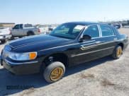 ✅ 1998 Lincoln Town Car Signature • VIN: 1LNFM82W4WY614425 • Lot: 42965120. Listed on IAAI with 164,023 mi. Free auction sales archive from the USA and detailed vehicle history report at DreamBid. Image 2.