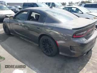 2019 Dodge Charger Scat Pack with VIN 2C3CDXGJ4KH564018, listed as a IAAI auction lot 43324116 with 61,977 mi miles and . Bid and sale history available at DreamBid. Image 3.