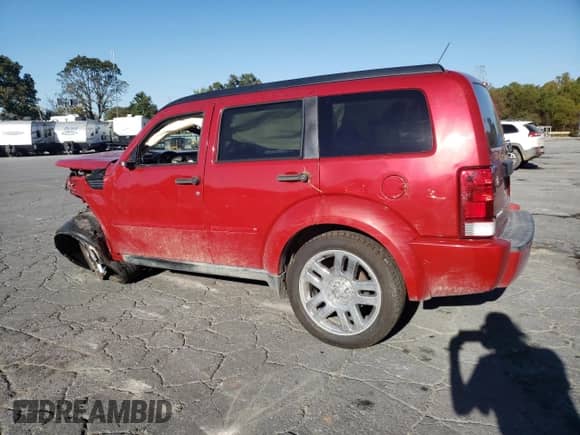 2011 Dodge Nitro Heat with VIN 1D4PT4GK0BW605305, listed as a Copart auction lot 74537124 with 126,632 mi miles and Salvage title. Bid and sale history available at DreamBid. Image 2.