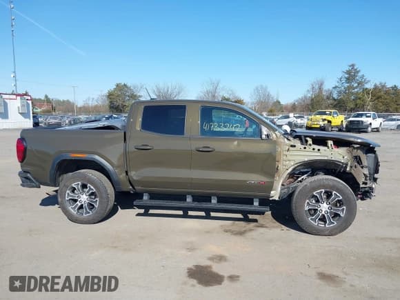 ✅ 2023 GMC Canyon 4WD AT4 • VIN: 1GTP6DEK1P1174713 • Lot: 41733242. Listed on IAAI with 35,705 mi. Free auction sales archive from the USA and detailed vehicle history report at DreamBid. Image 13.