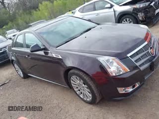 ✅ 2010 Cadillac CTS Performance • VIN: 1G6DL5EG0A0124253 • Lot: 42153222. Listed on IAAI with 128,203 mi. Free auction sales archive from the USA and detailed vehicle history report at DreamBid. Image 1.