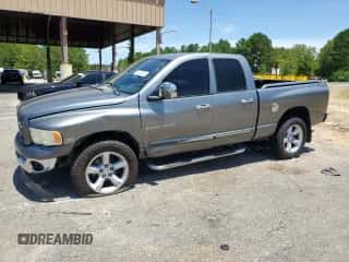2005 Dodge 1500 SLT с VIN 1D7HU18DX5J594981, выставлен на аукционе Copart как лот 62614024 с пробегом 291 055 миль миль и Списание • Salvage title. История ставок и продаж доступна на DreamBid. Изображение 1.