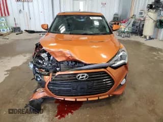 ✅ 2015 Hyundai Veloster Turbo • VIN: KMHTC6AE7FU225062 • Lot: 82557604. Wystawiony na Copart z przebiegiem 98 696 mil. Bezpłatny archiwum sprzedaży aukcyjnych z USA i szczegółowy raport historii pojazdu na DreamBid. Zdjęcie 5.