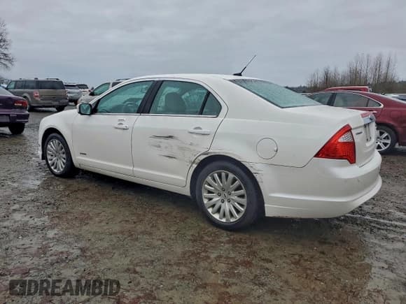 ✅ 2010 Ford Fusion Hybrid • VIN: 3FADP0L39AR228461 • Lot: 94741395. Listed on Copart with 131,394 mi. Free auction sales archive from the USA and detailed vehicle history report at DreamBid. Image 2.